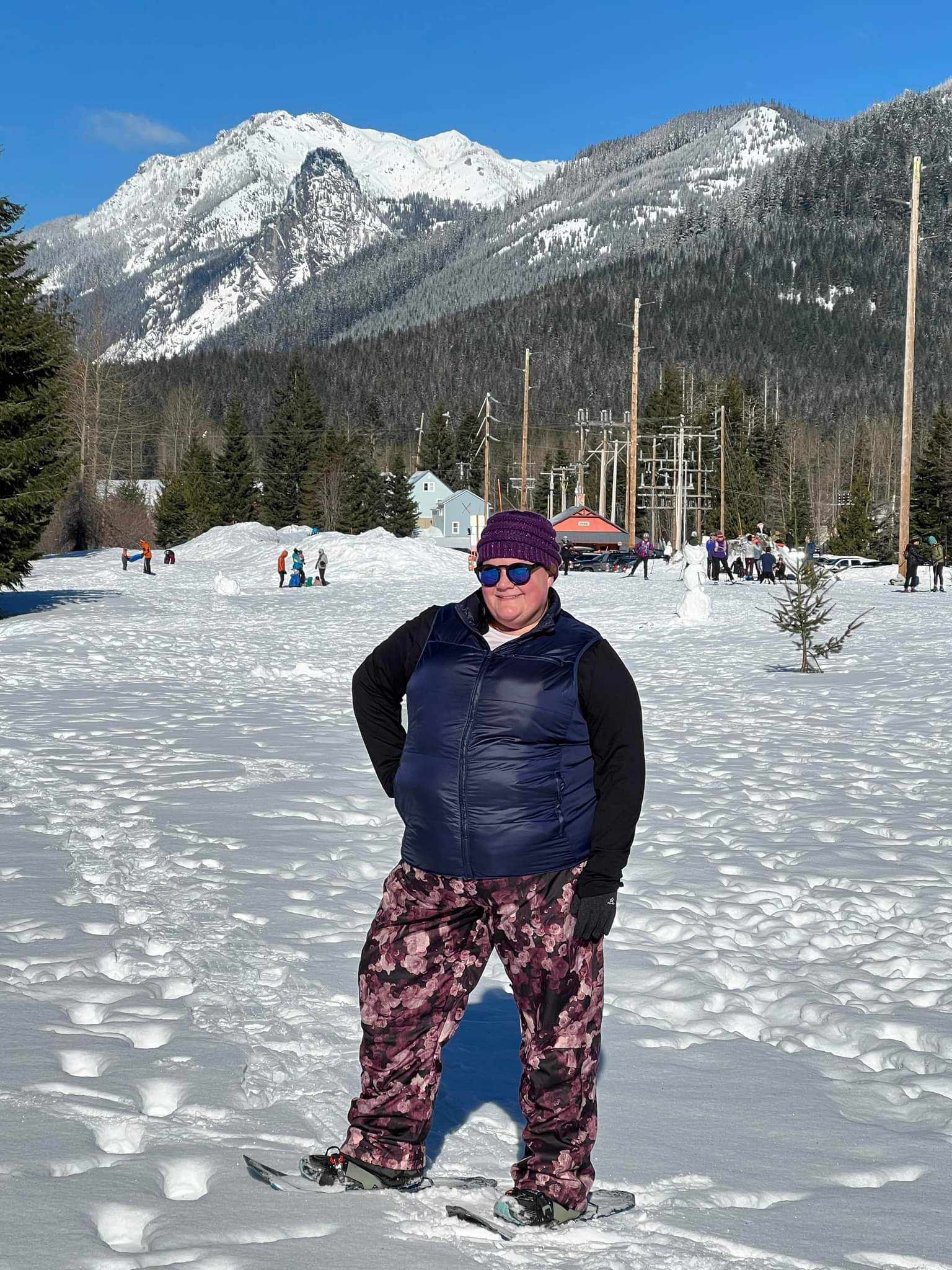 MIa is wearing the statement pants while snow shoeing.