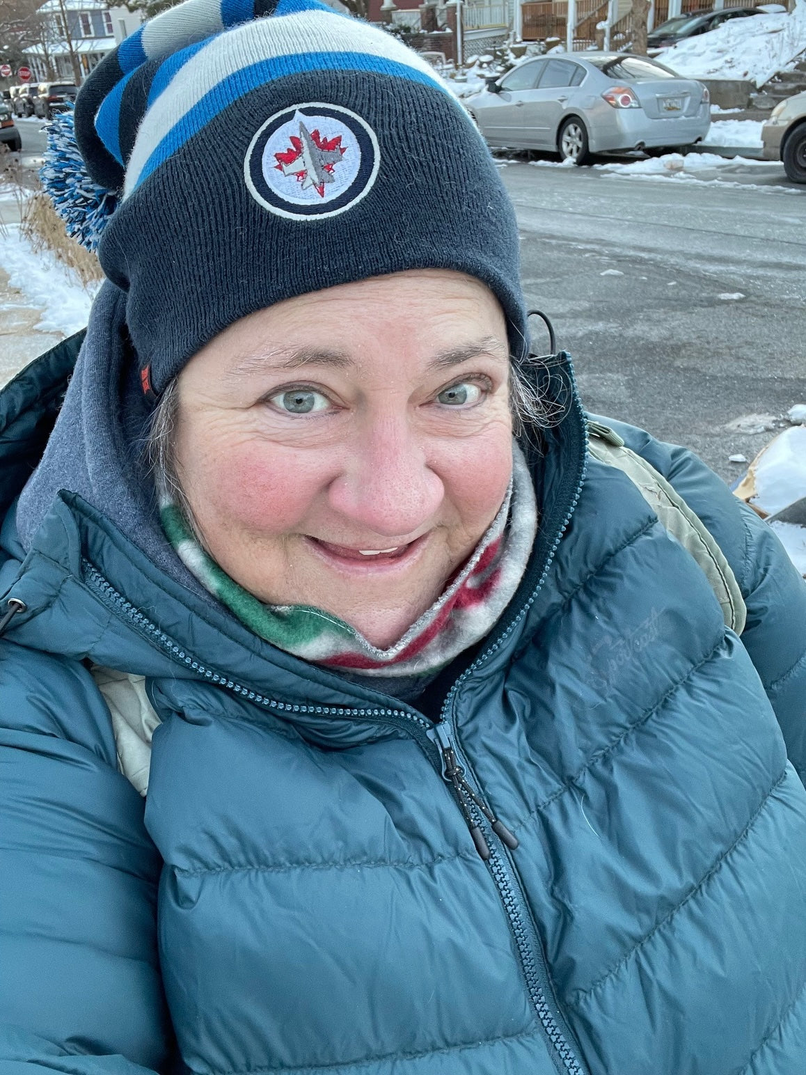 Happy customer Valerie wearing the powder down plus size jacket.
