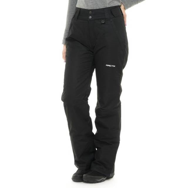 Front view of woman wearing Arctix Plus Size Snow Pants in Black