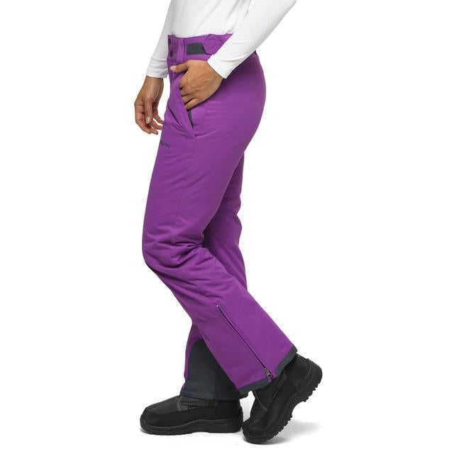 Left view of woman wearing Arctix Plus Size Snow Pants in Amethyst
