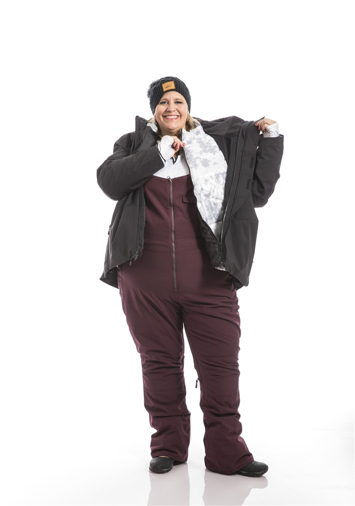 Kindra wearing a Swiss System 3 in one jacket over Groove Bibs