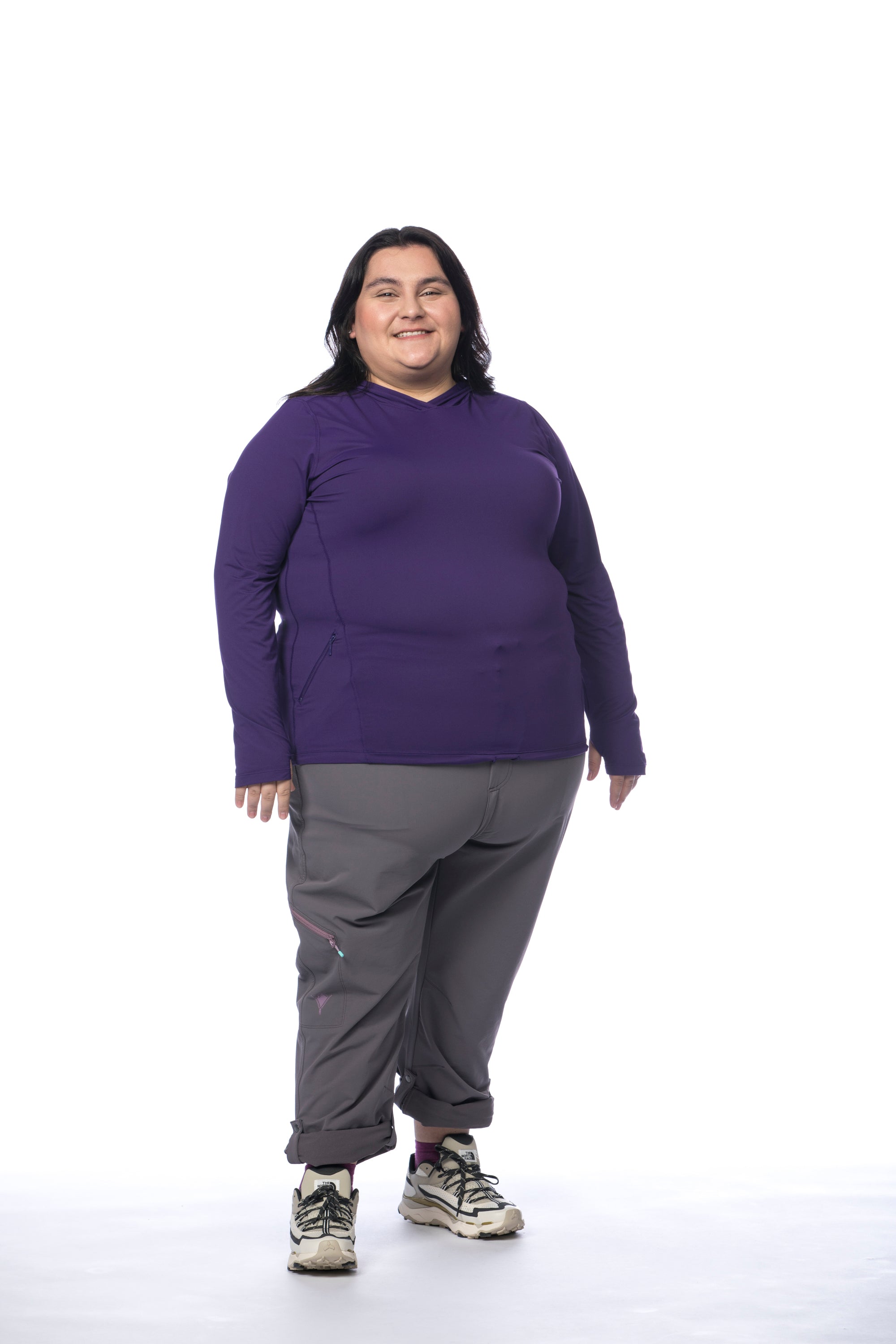 Front view of Bri wearing the Gnara Go There plus size pants in Cascade Granite