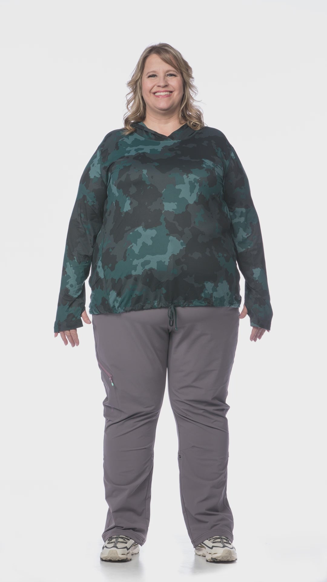360 view of Kindra wearing the Mountain Hardwear Crater Lake Plus Size LS Hoody in Dark Marsh Pines Camo