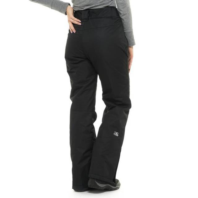 Back view of woman wearing Arctix Plus Size Snow Pants in Black
