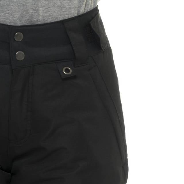 Close up view of pocket of woman wearing Arctix Plus Size Snow Pants in Black