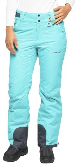Front view of woman wearing Arctix Plus Size Snow Pants in Blue Bird