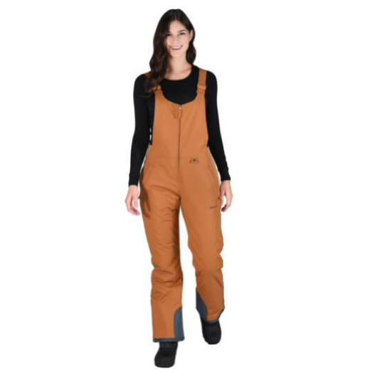 Front view of woman wearing Arctix snow bibs in cappuccino