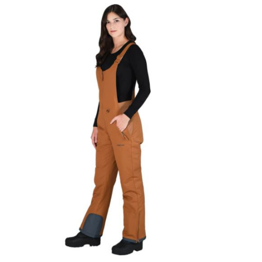 Side view of woman wearing Arctix snow bibs in cappuccino
